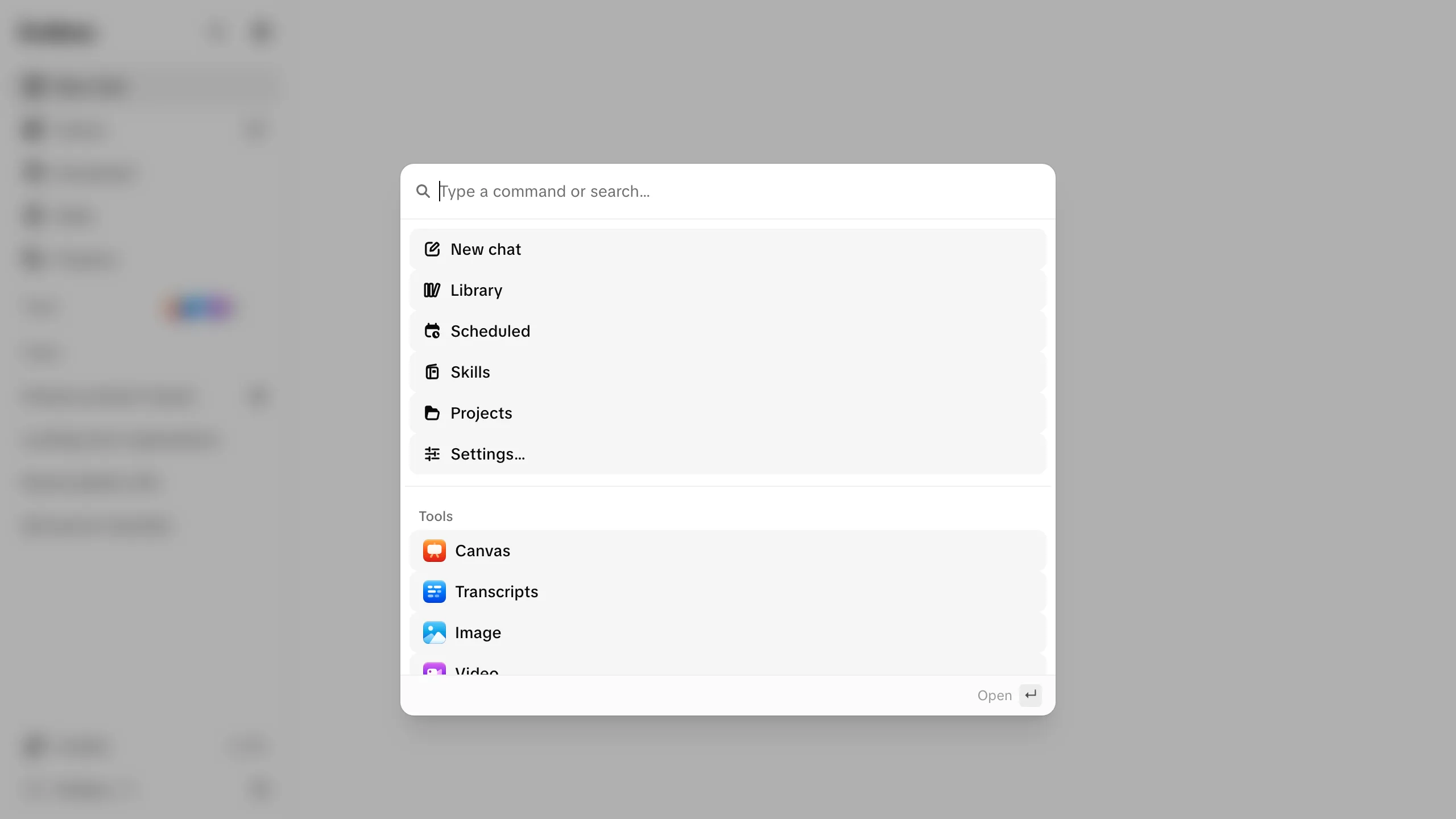 The command palette open over a dimmed workspace: a “Type a command or search…” field, jump targets for New chat, Library, Scheduled, Skills, Projects and Settings, a Tools group with Canvas, Transcripts, Image and Video, and an Open hint in the footer